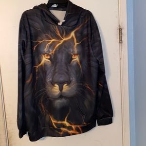 Mens Graphic Hoodie Size XXL in kids I think. Orange and black with lion picture